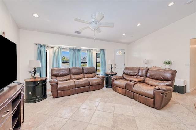 living room with vaulted ceiling and ceiling fan