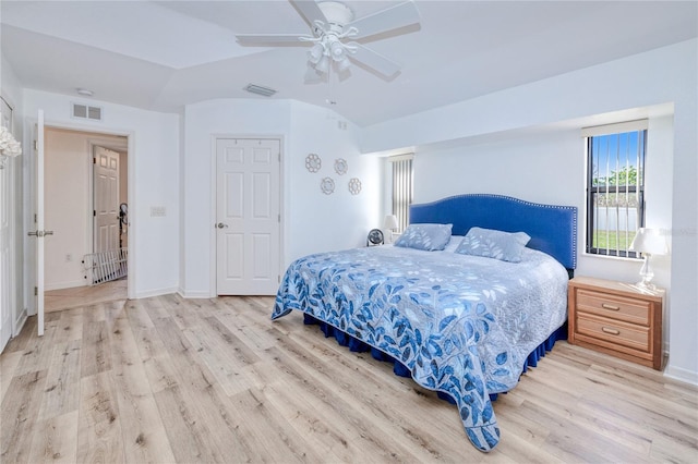 bedroom with ceiling fan and light wood-type flooring