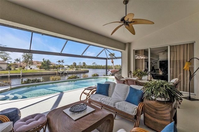 exterior space with a water view, ceiling fan, and lofted ceiling