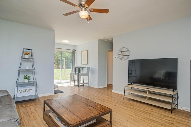 11369 1st Ave, Punta Gorda, FL 33955 - living room featuring light hardwood / wood-style flooring and ceiling fan