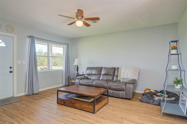 11369 1st Ave, Punta Gorda, FL 33955 - living room featuring ceiling fan and light wood-type flooring