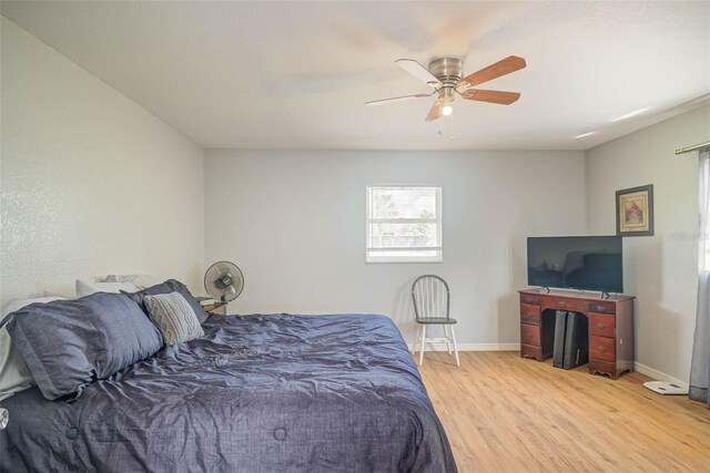 11369 1st Ave, Punta Gorda, FL 33955 - bedroom with ceiling fan and light hardwood / wood-style flooring