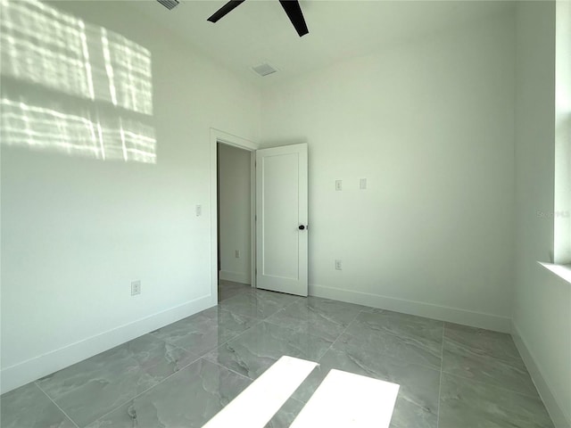 empty room with ceiling fan