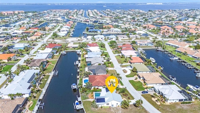 drone / aerial view with a water view