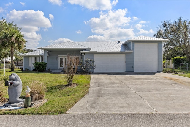 ranch-style house with a garage and a front yard