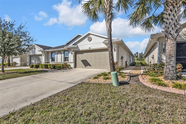 ranch-style house featuring concrete driveway, a front lawn, an attached garage, and stucco siding