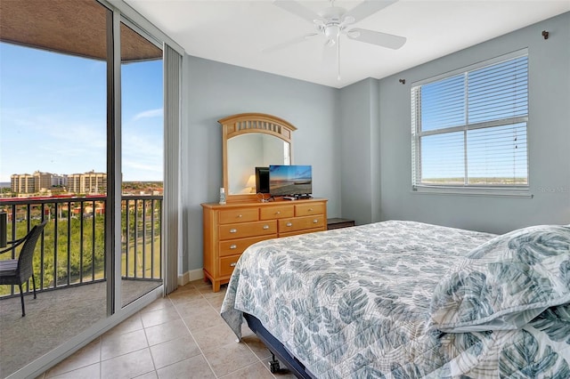 bedroom with ceiling fan, light tile patterned floors, and access to outside