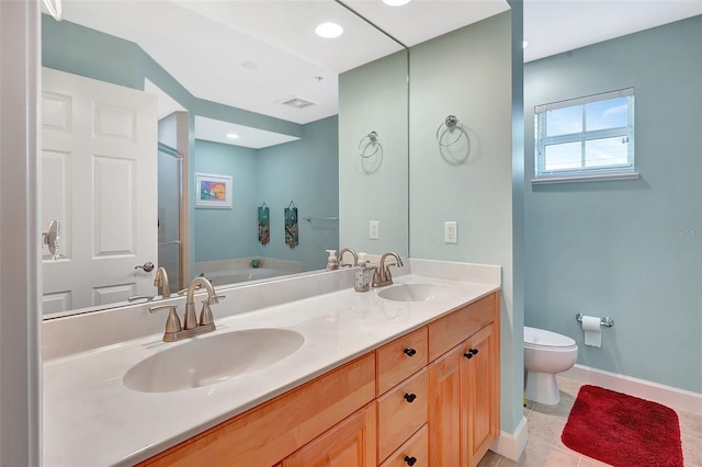 full bathroom with tile patterned floors, toilet, vanity, and plus walk in shower