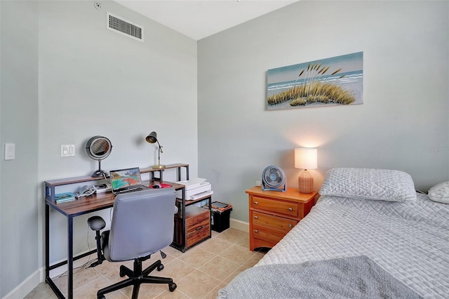 bedroom featuring light tile patterned floors