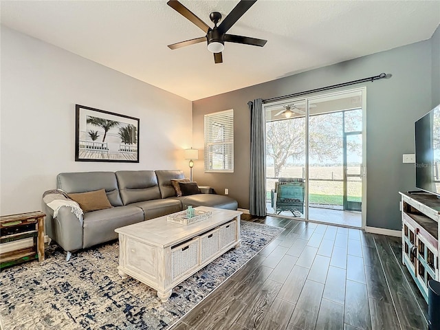 8858 Tuscany Isles Dr, Punta Gorda, FL 33950 - living room with dark wood-type flooring and ceiling fan