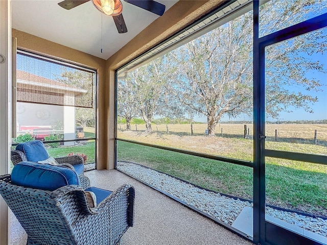 8858 Tuscany Isles Dr, Punta Gorda, FL 33950 - sunroom with a rural view and ceiling fan
