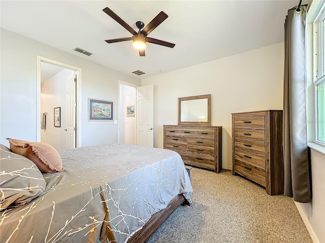 8858 Tuscany Isles Dr, Punta Gorda, FL 33950 - bedroom featuring ceiling fan and light colored carpet