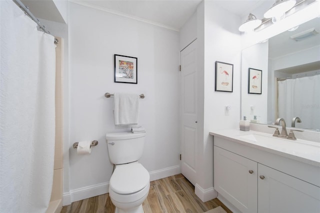 bathroom featuring toilet, vanity, wood-type flooring, and a shower with shower curtain