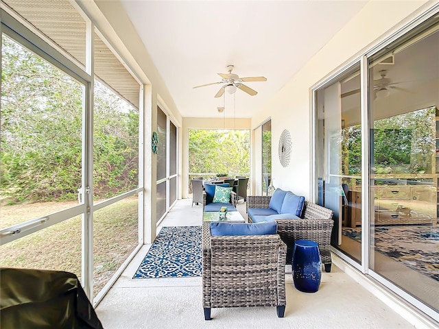 sunroom / solarium with ceiling fan