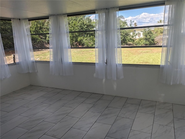 710 Aqui Esta Dr, Punta Gorda, FL 33950 - unfurnished sunroom with a wealth of natural light