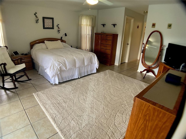 bedroom featuring ceiling fan and light tile patterned flooring