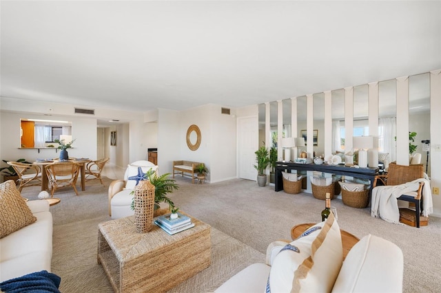 living room featuring light colored carpet