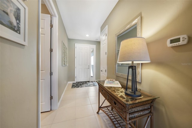 foyer entrance featuring light tile patterned floors