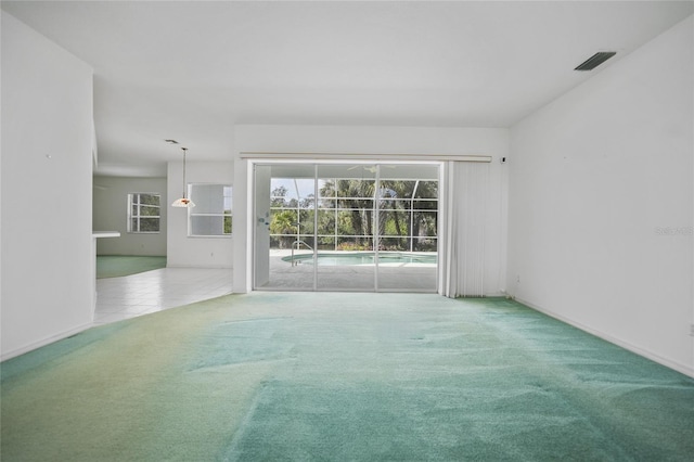 view of carpeted spare room