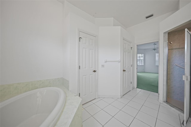 bathroom featuring independent shower and bath and tile patterned floors