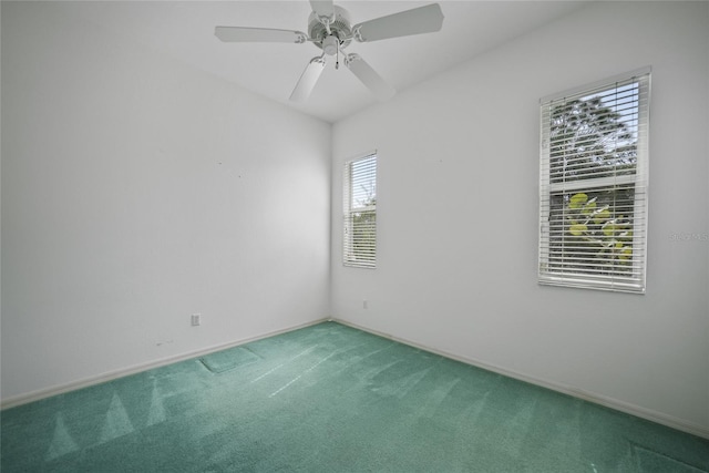 unfurnished room featuring carpet and ceiling fan