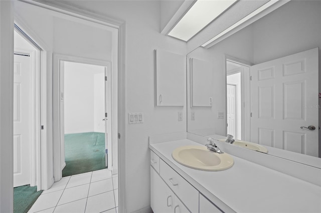 bathroom featuring tile patterned floors and vanity