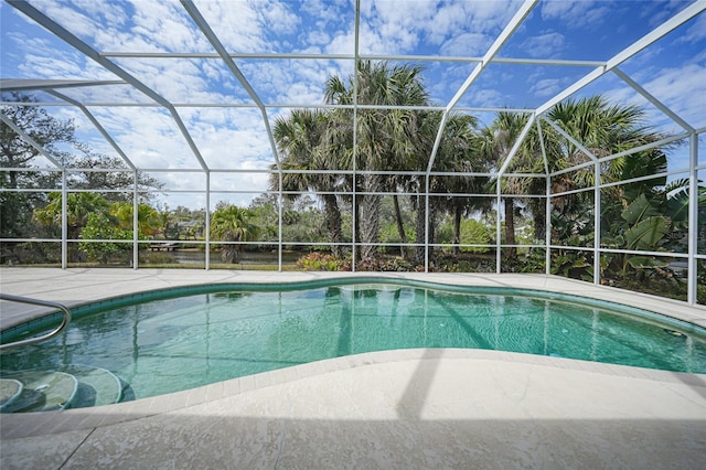 view of pool featuring a lanai