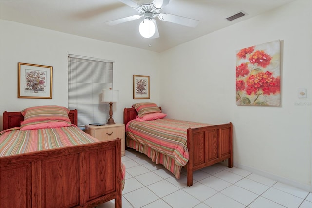 bedroom featuring light tile patterned flooring and ceiling fan