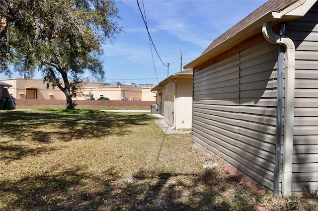 view of yard with fence