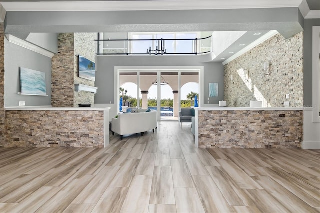 reception area with an inviting chandelier and french doors