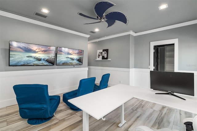 office with hardwood / wood-style flooring, ceiling fan, and crown molding