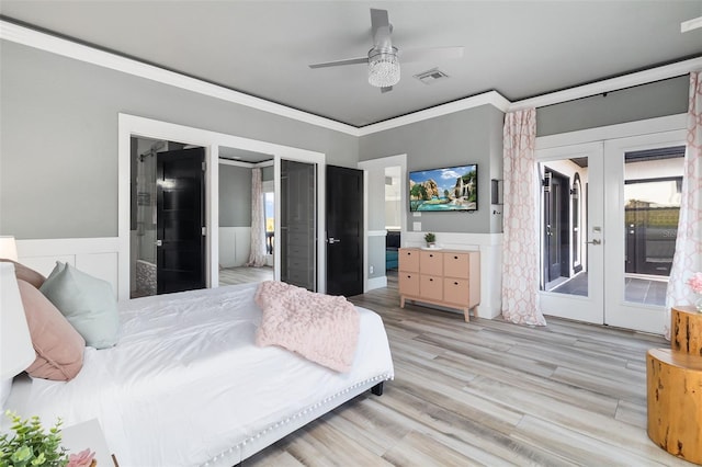 bedroom with access to outside, ensuite bath, french doors, light hardwood / wood-style floors, and crown molding