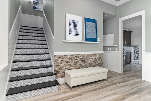 stairs with hardwood / wood-style floors