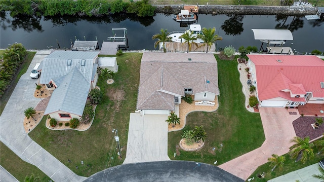 drone / aerial view featuring a water view