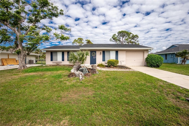 ranch-style house with a garage and a front lawn