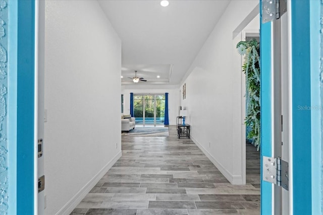 foyer entrance featuring ceiling fan, recessed lighting, wood finished floors, and baseboards