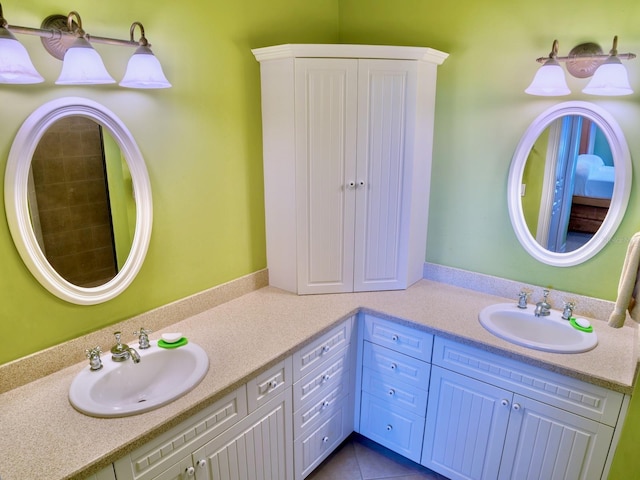 bathroom featuring vanity and tile patterned flooring