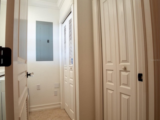 hallway featuring ornamental molding, electric panel, and light tile patterned flooring