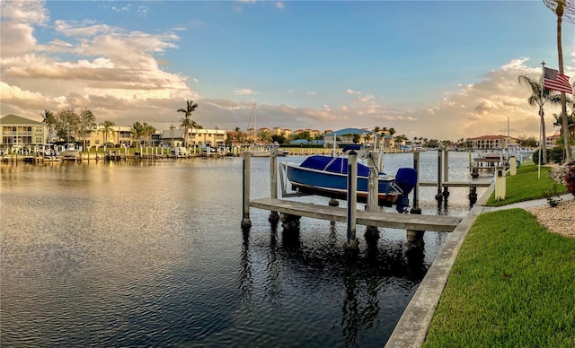 dock area featuring a water view