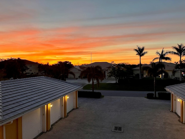 view of patio terrace at dusk