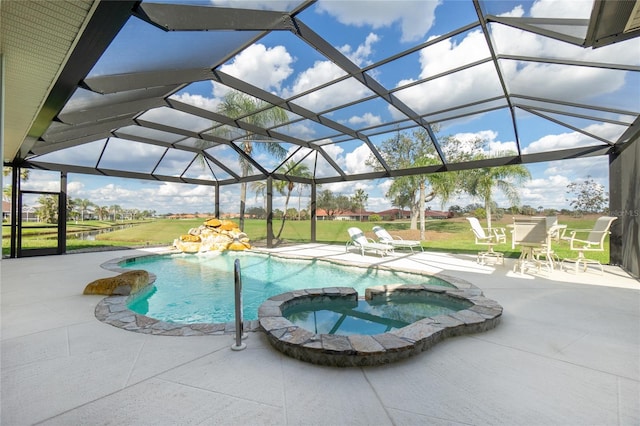 view of pool with a lanai, a lawn, a patio, and an in ground hot tub