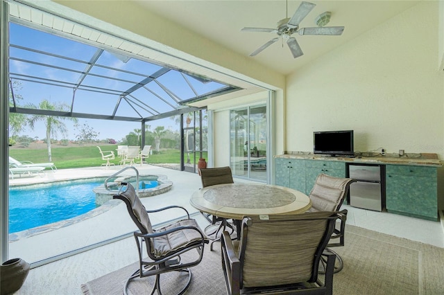 interior space with ceiling fan