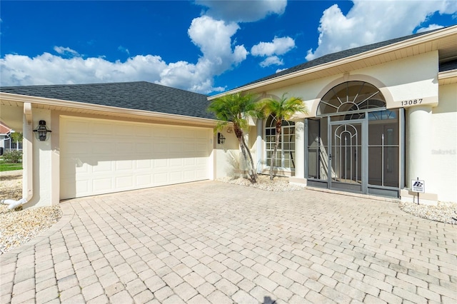 view of front of home with a garage