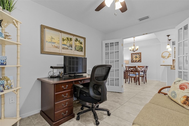 home office with light tile patterned floors, ceiling fan with notable chandelier, visible vents, and baseboards