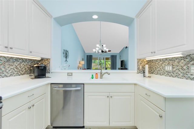 kitchen featuring sink, white cabinetry, dishwasher, decorative light fixtures, and decorative backsplash