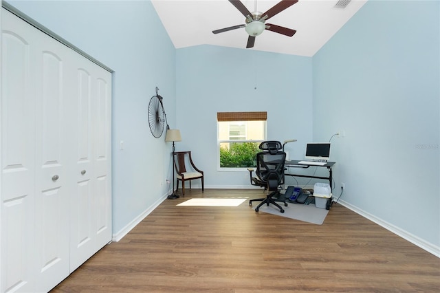 office space featuring high vaulted ceiling, ceiling fan, and wood-type flooring