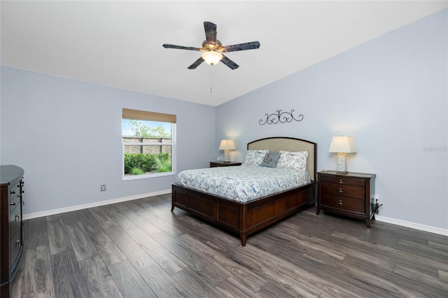 bedroom with ceiling fan and dark hardwood / wood-style flooring