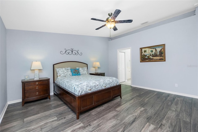 bedroom with dark hardwood / wood-style flooring and ceiling fan