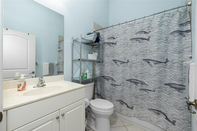 bathroom with a shower with shower curtain, vanity, tile patterned flooring, and toilet