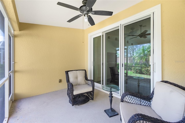 sunroom / solarium with ceiling fan